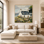 Wildflower Haven textured coastal cottage oil painting displayed above a cream sofa in a sunlit living room